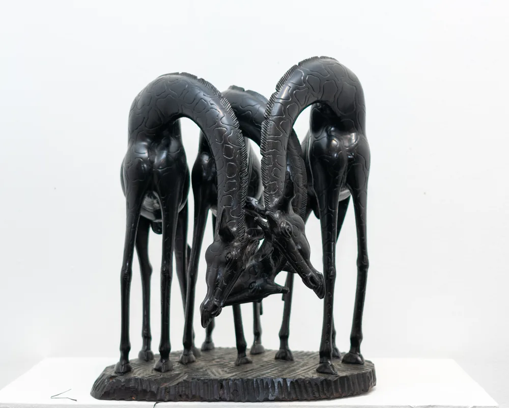 Contemporary ebony giraffe sculpture representing the Modern Gallery