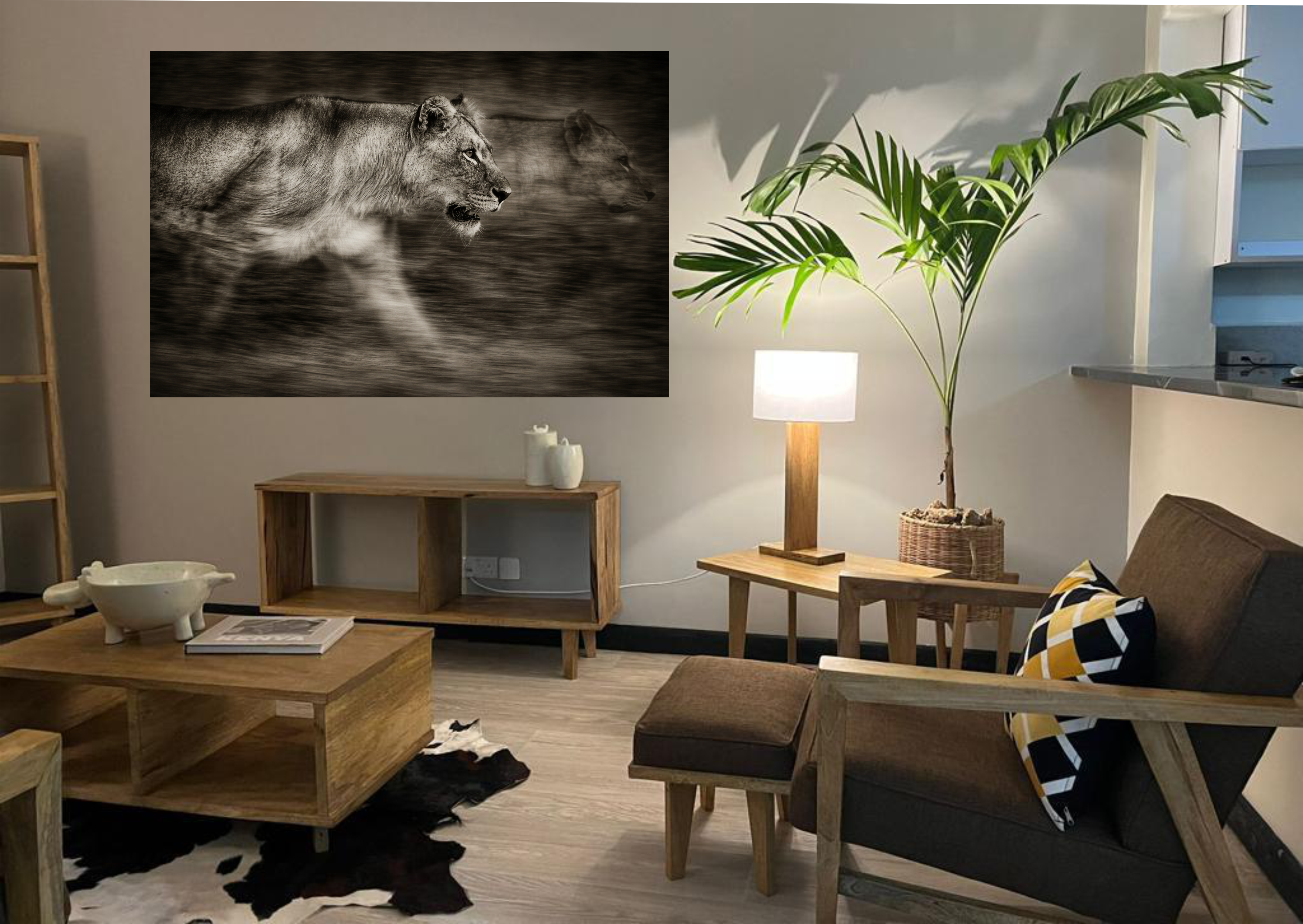 Jua Range living room styled with timber furniture, ambient lighting and wildlife art
